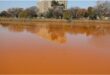 discoloured lake water
