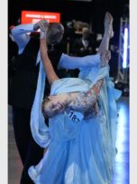 a man and woman dancing