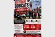 A poster showing a cheerleading squad in action with wording in black and red.