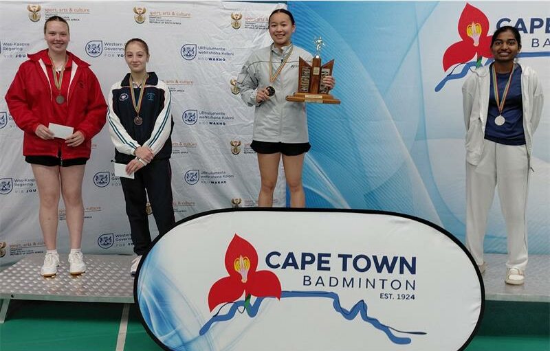 She claimed a straight set 21-10, 21-16 victory over Chidvi Panjala to win the women's singles title, before adding a gold and bronze in the doubles.