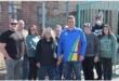 a group of people outside a building