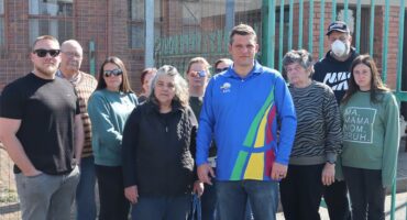 a group of people outside a building