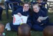 Two young learners in school uniform
