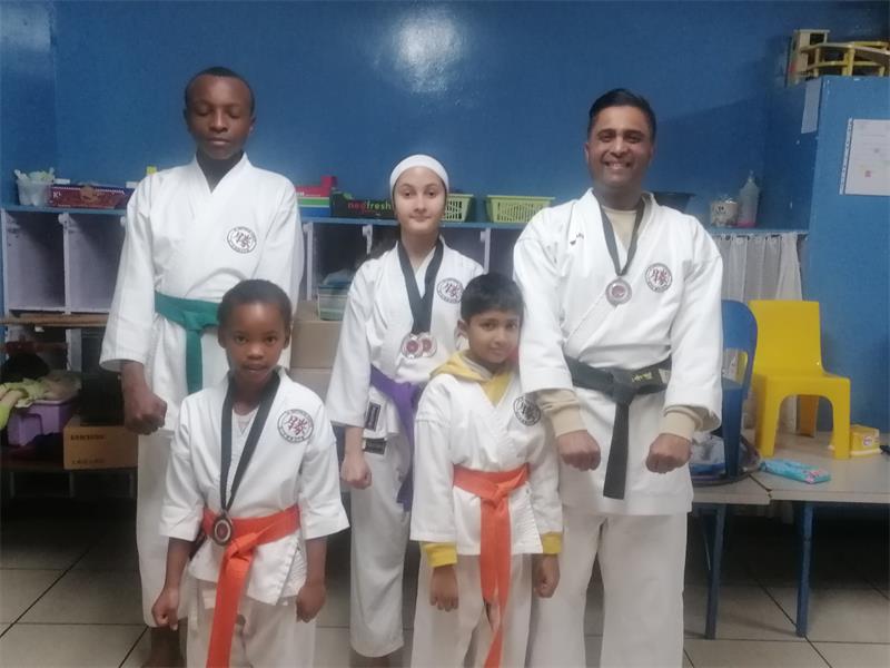 The club collected 11 medals in the Goshukan Invitational Championships, while eleven members graded up two weeks earlier.