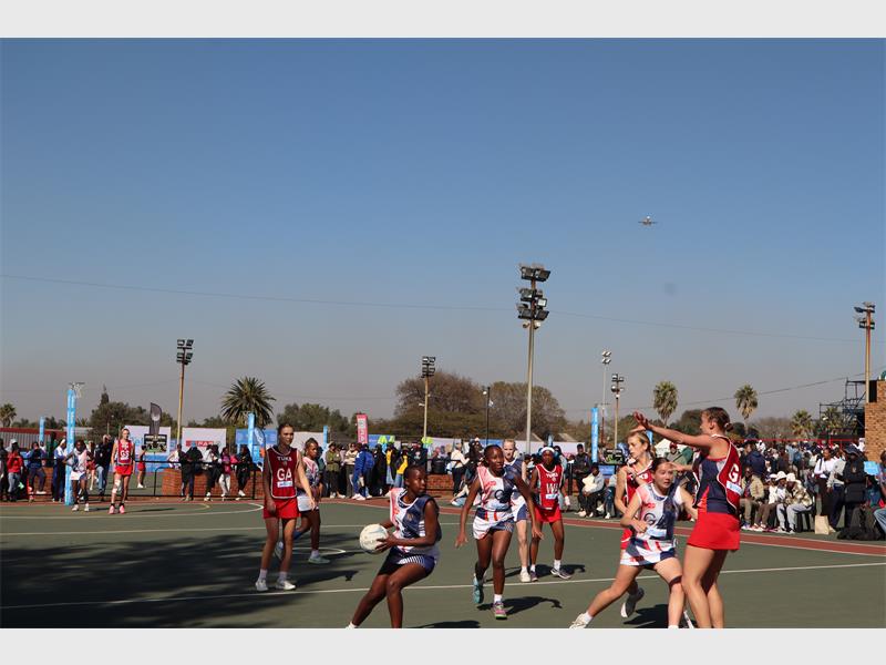 A netball game in action.