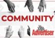 A black and white image of hands of different shades reaching into the word Community in red and the Boksburg Advertiser logo in the bottom right corner.