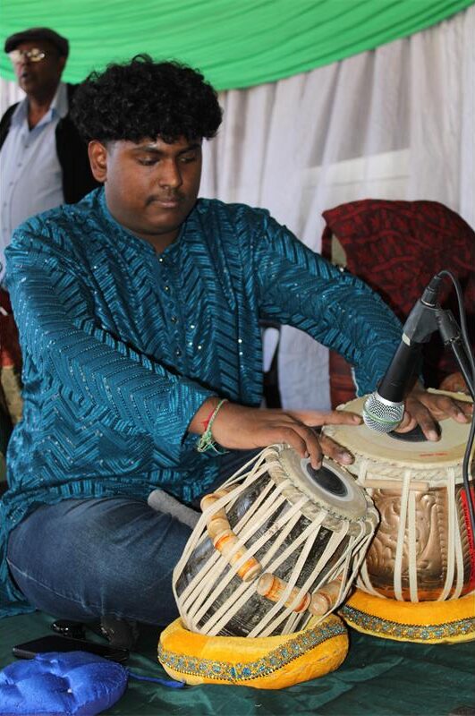 Indian man playing drums