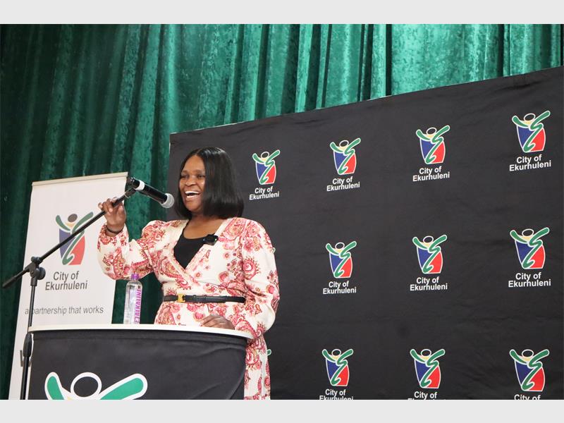 a woman addressing a crowd
