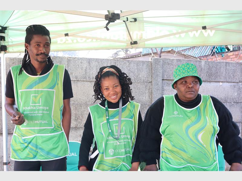 three people in Old mutual uniform