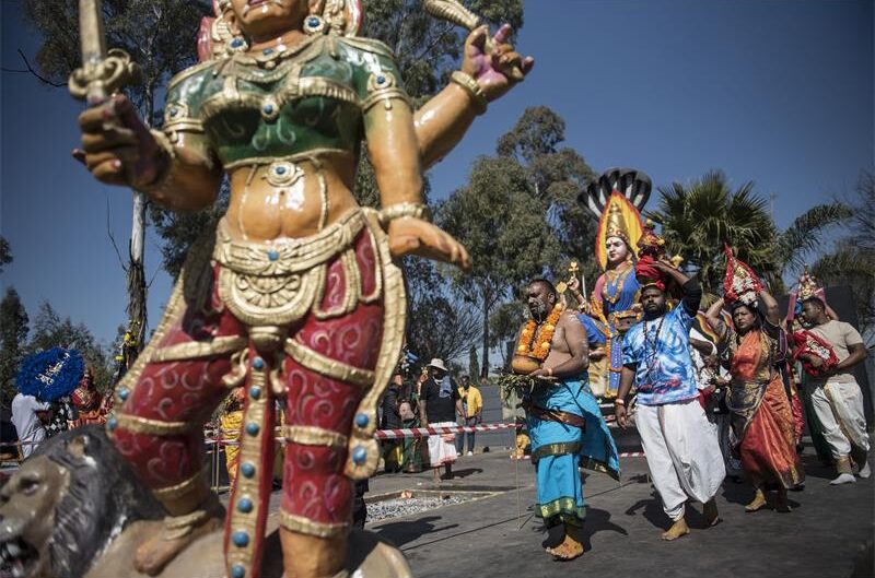 A group of Indian people walking
