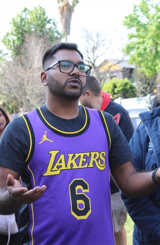 Indian man wearing a purple shirt