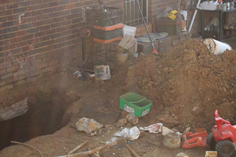 Photo of a hole under a house