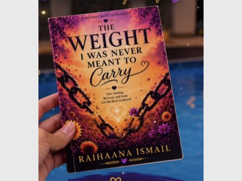 A book cover with the words the weight I was never meant to carry and hand holding the book.