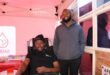 Two black men inside a SANBS gazebo