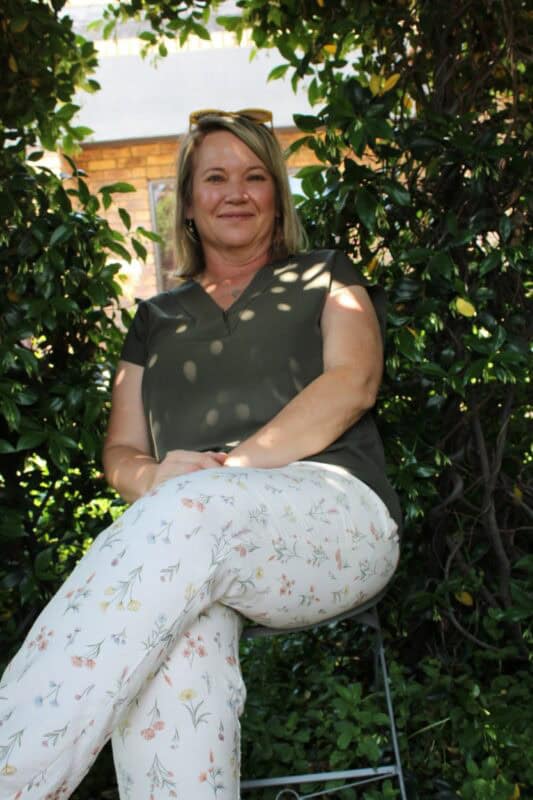 Woman sitting in a garden