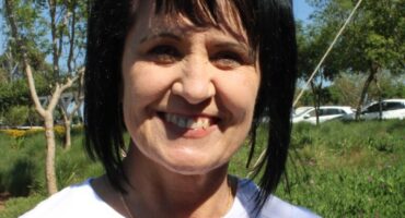 Woman with mid-length dark hair