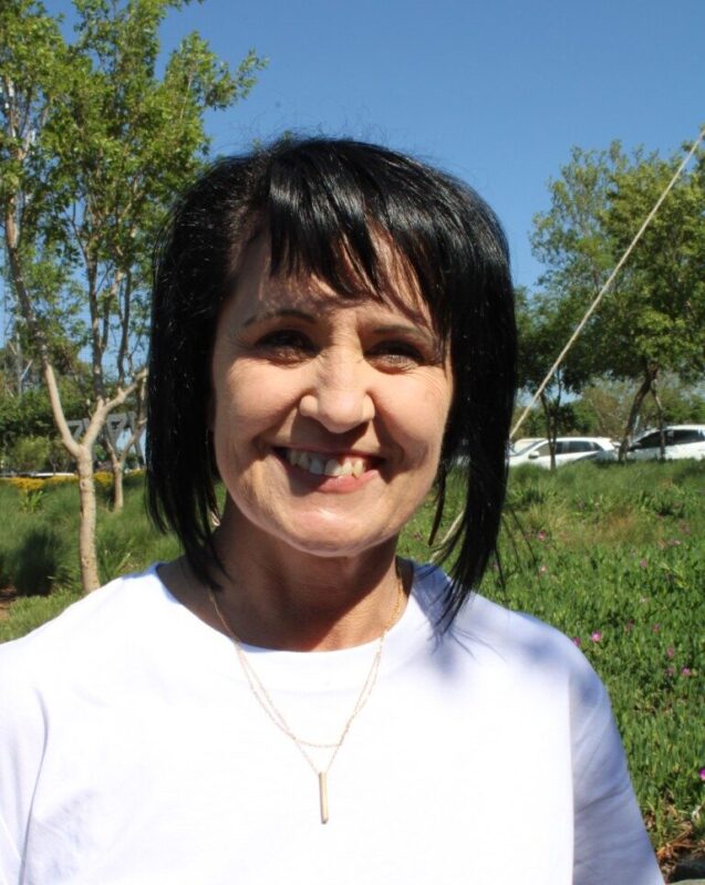 Woman with mid-length dark hair