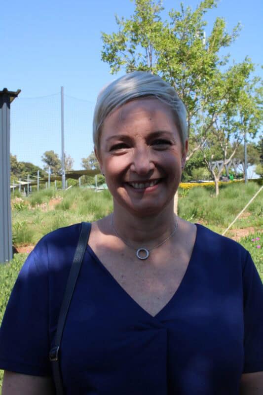 Woman with short blonde hair