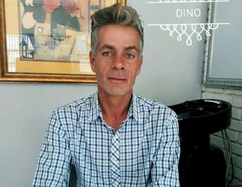 A man in a blue shirt
