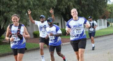 Group of road runners smiling