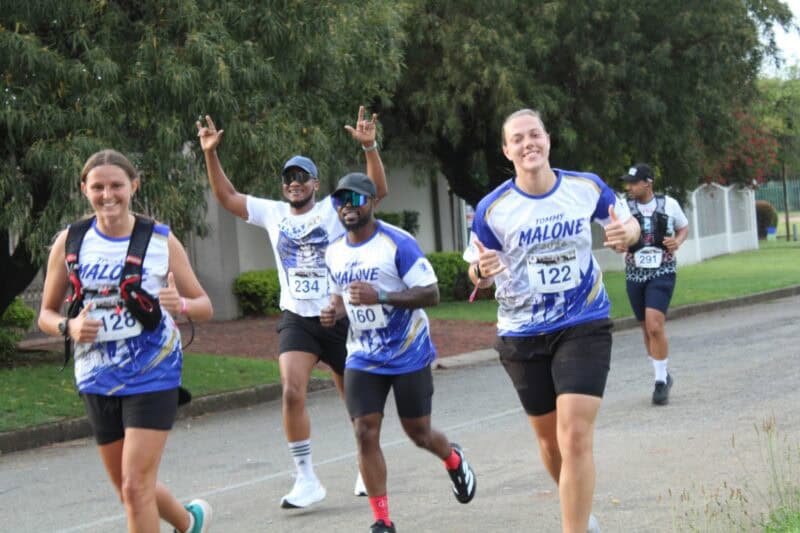 Group of road runners smiling
