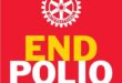 Red poster with the Rotary International logo with the words end polio now