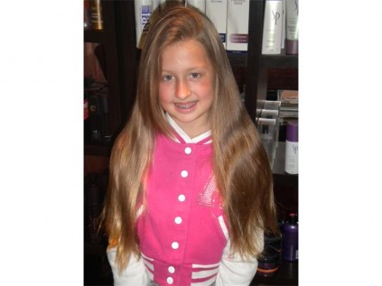 Farrarmere Primary Grade Three pupil Jessica Piper (9) before she cut off her hair for cancer.