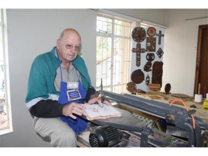 Roy Thompson demonstrates working with wood.
