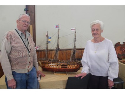 Jan and Mona van Wyk are seen with the model ship that Jan built completely from match sticks.
