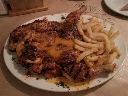 Baby chicken, juicy and deliciously seasoned and marinated, with mild flavours and a side of chips.