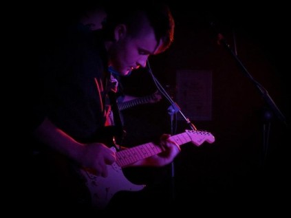 Tyrone Parsons on guitar.