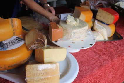 A variety of interesting cheeses at the market.