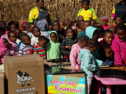 Children of NCCC some of the caregivers and boxes that Steffani donated (Medium)