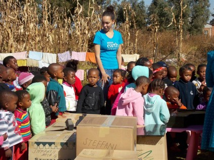 Steffani singing with the children of NCCC (Medium)