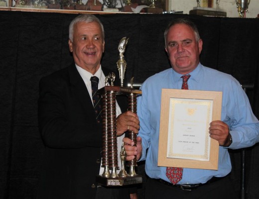 Clubperson of the Year Ashley George (right) is seen with Manny Ferreirinho.