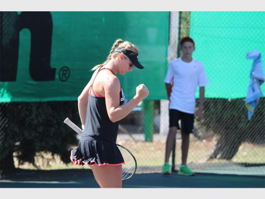 Ilze Hattingh pumps her first to celebrate a winning point in her Wilson R100 000 Challenge women’s singles final, against Lee Barnard, at the Gauteng East Tennis Centre, in Lakefield, on Monday.
