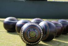 A group of black bowls balls