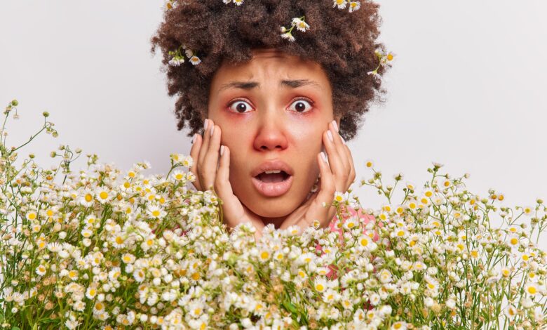 Close,Up,Shot,Of,Worried,Shocked,African,American,Womangrabs,Face