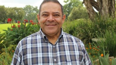Indian man standing in a garden