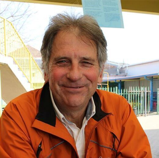 Man wearing an orange jacket