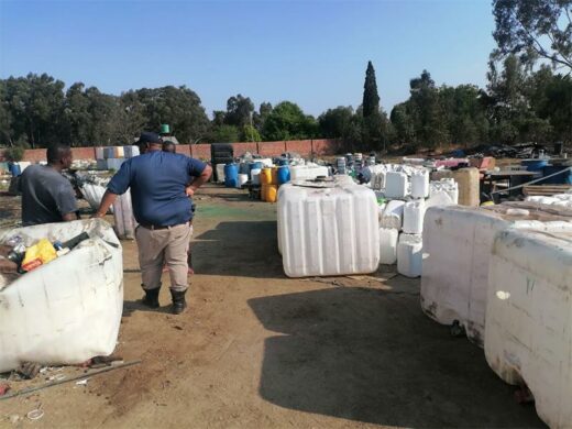 EMPD officials inspecting an illegally run business within the agricultural holdings, in Benoni