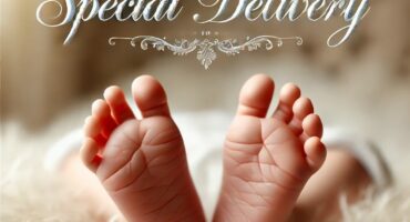 A baby’s feet resting on a white blanket with text at the top.