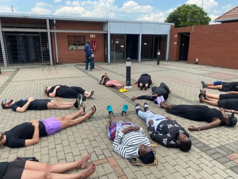 The group chose the court as their protest site to highlight the journey many victims begin when seeking justice.