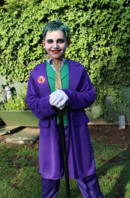 Boy dressed as DC Comic's Joker