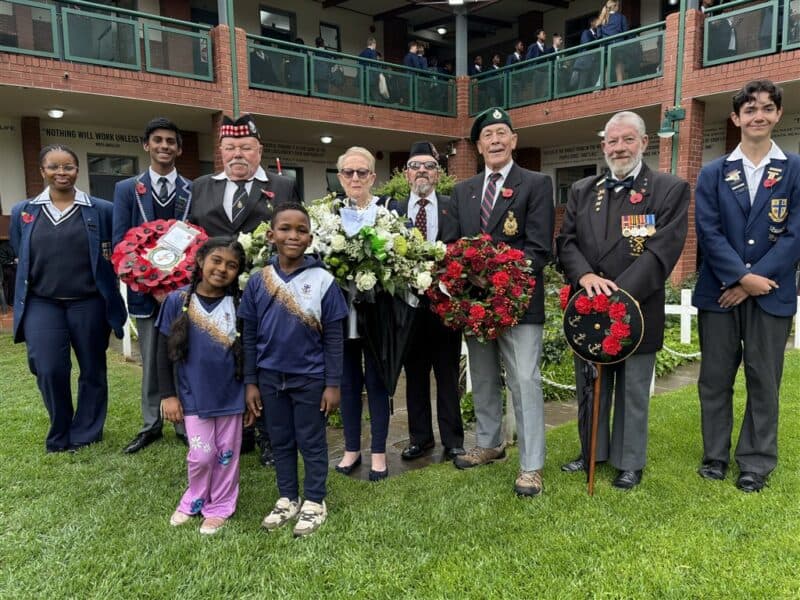 Each attendee wore a red poppy, a symbol of remembrance, and wreaths were laid to pay tribute to the fallen heroes.
