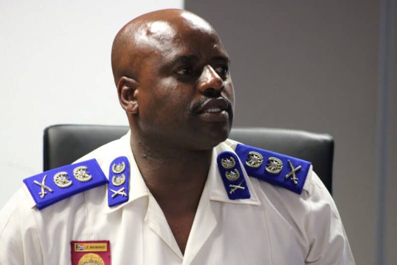 Acting EMPD chief Julius Mkhwanazi dressed in police uniform, and sitting on an office chair at the municipal offices in Germiston