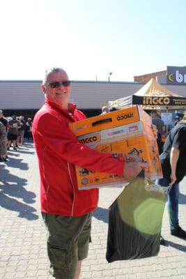 Man holding a yellow box
