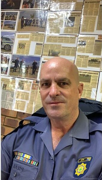 Bald man in a police uniform