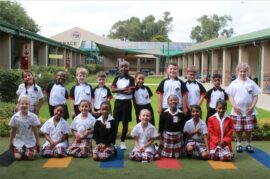 A photo of Ashton International College Grade One learners dressed in their school uniform.