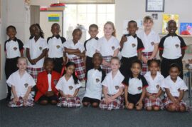 A photo of Ashton International College Grade One learners dressed in their school uniform.